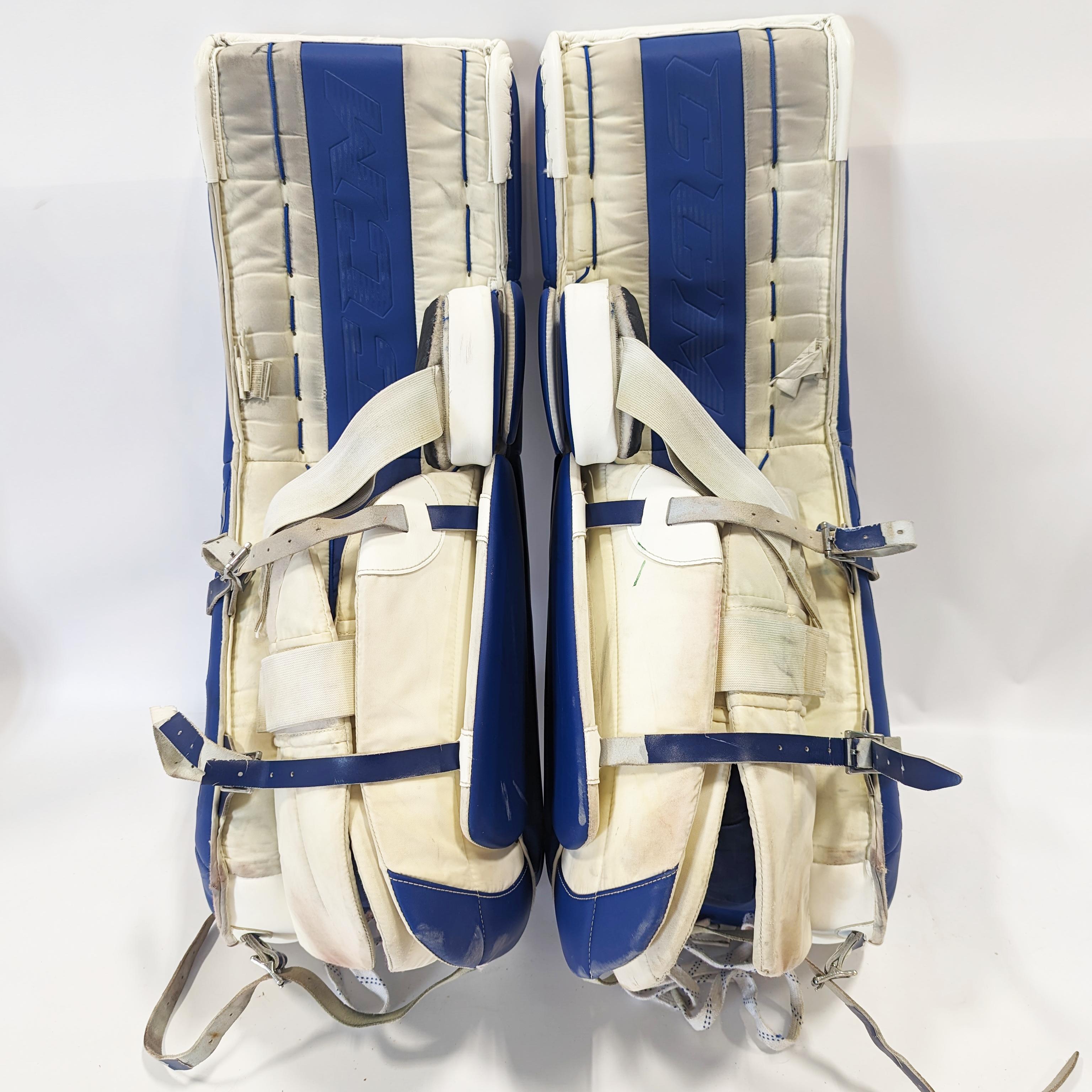 CCM Extreme Flex 5 - Jambières de gardien NCAA Pro Stock d'occasion (blanc/bleu)